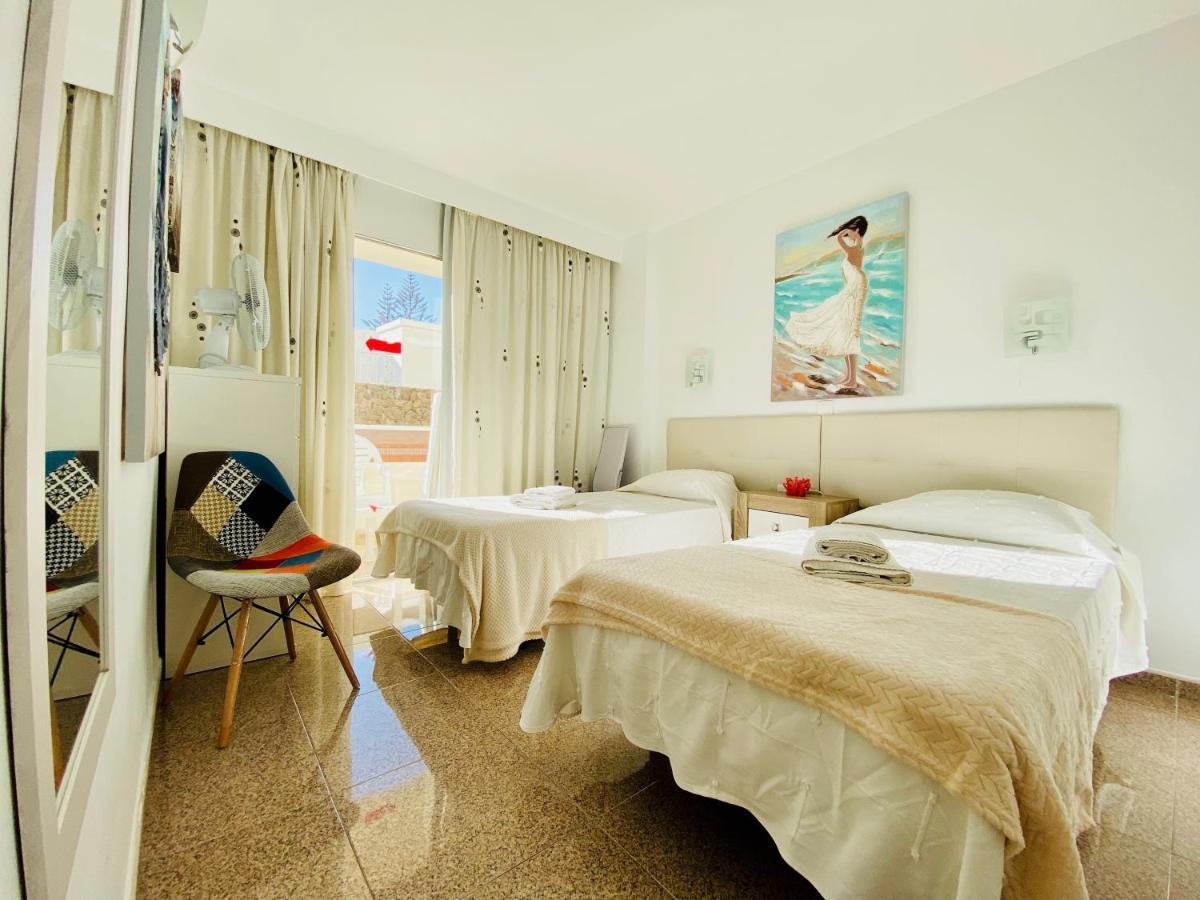 Orange And White Apartment In Yumbo San Bartolomé Exterior photo